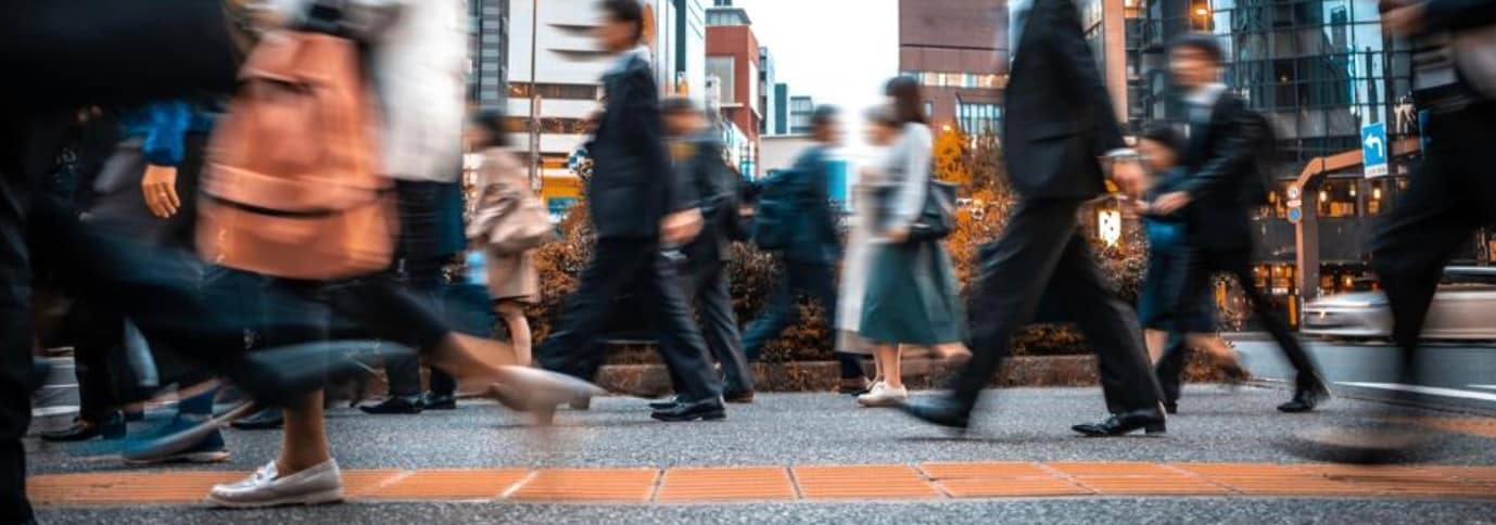 people walking to work in a city
