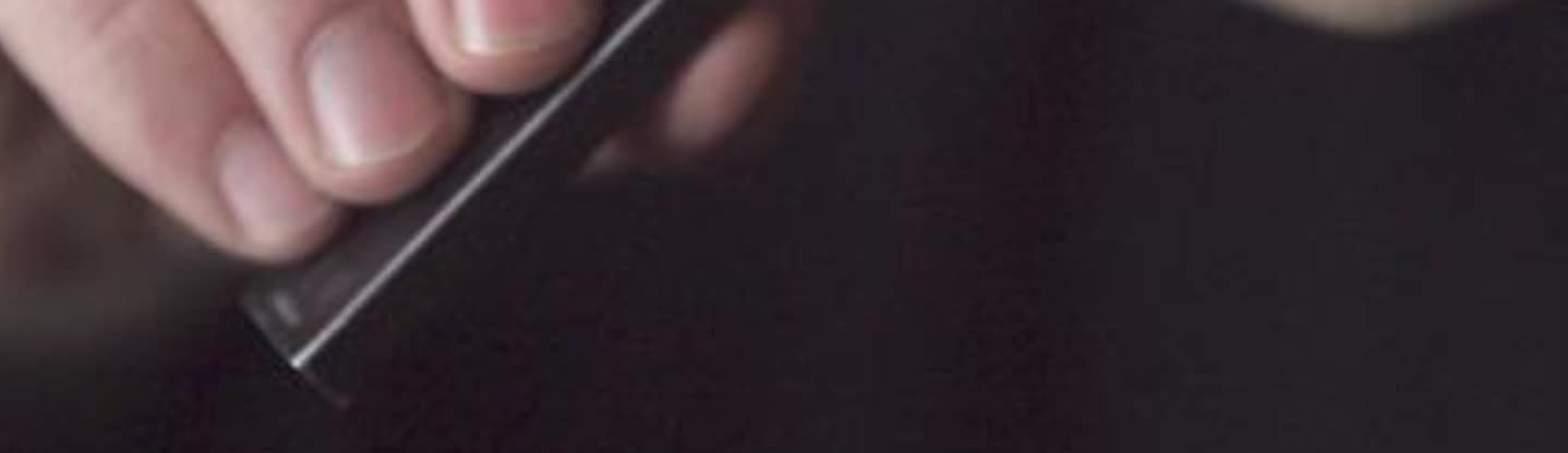 vaping device in hand
