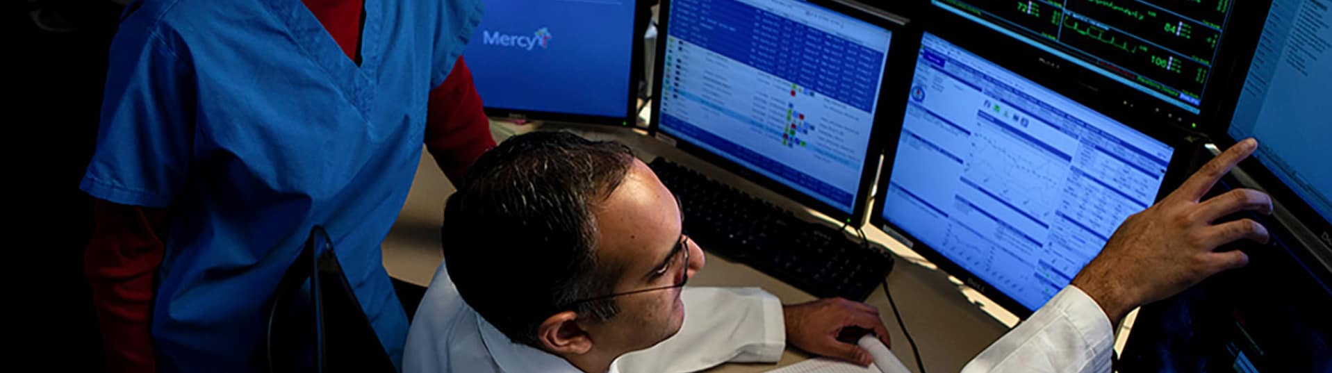 doctors at computer monitors