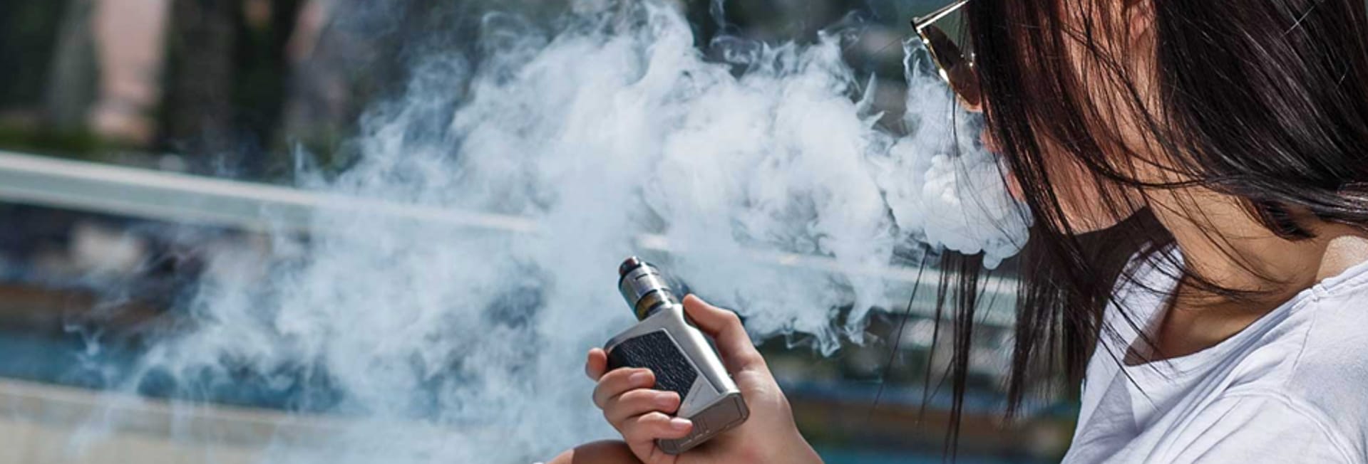 young woman vaping