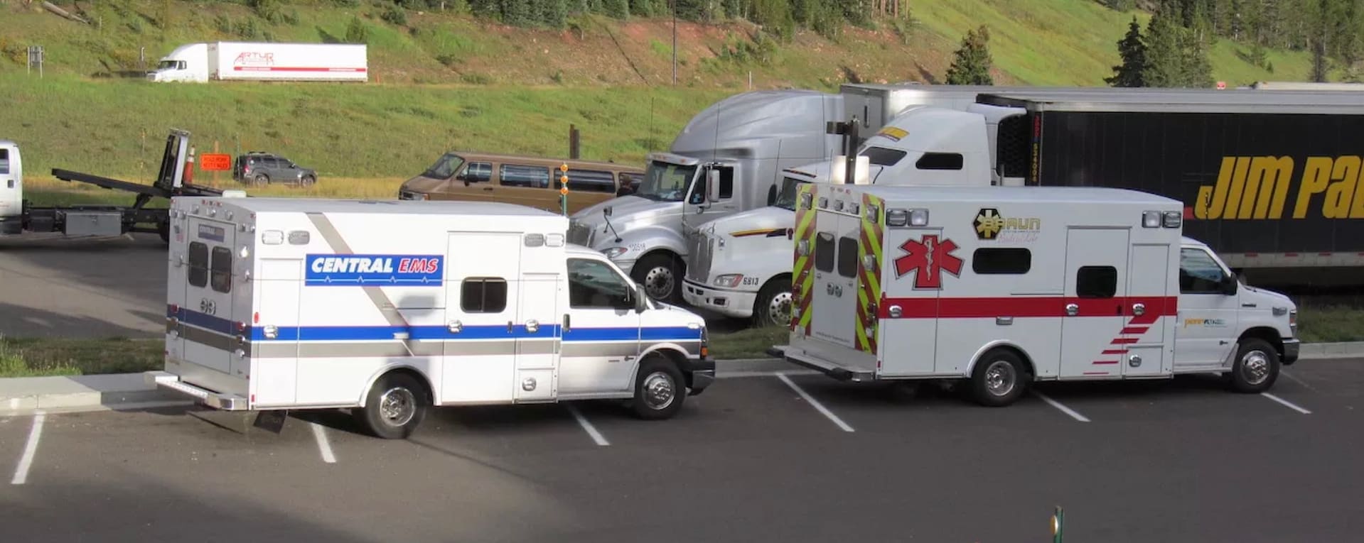 Two ambulances responding at an interstate highway wayside
