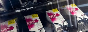 image of boxes of nalxone in a dispenser