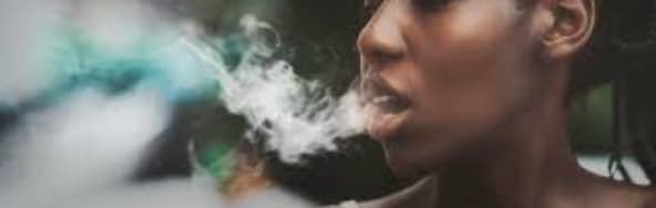 teenaged girl vaping
