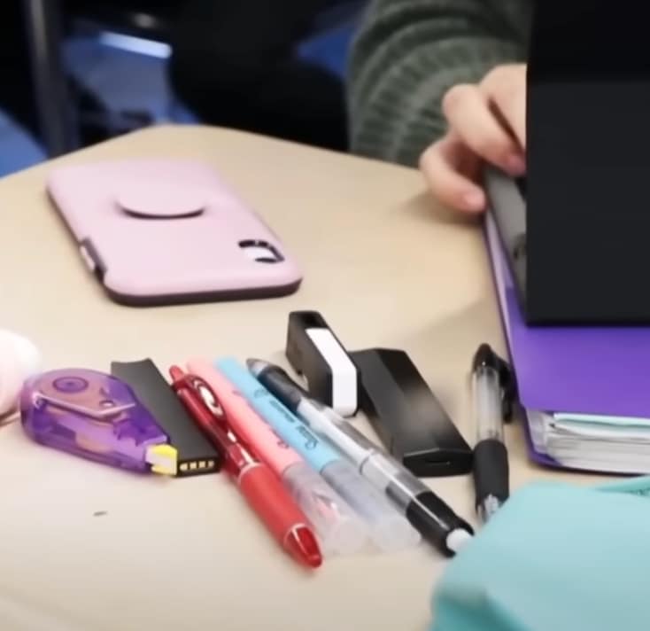 school supplies with disguised vape on student desk