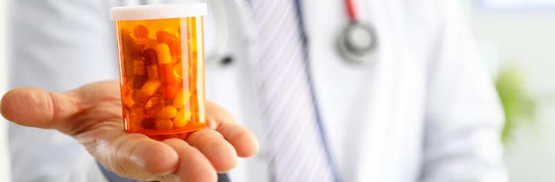 doctor with pills