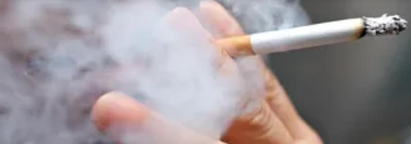 hand holding cigarette