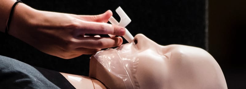 Narcan being administered to a medical dummy