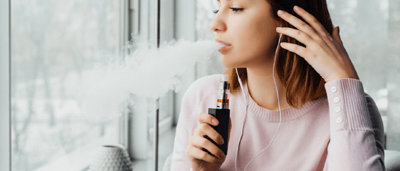 Teen girl vaping