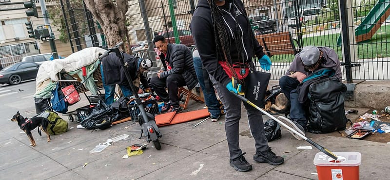 homeless persons on the sidewalk