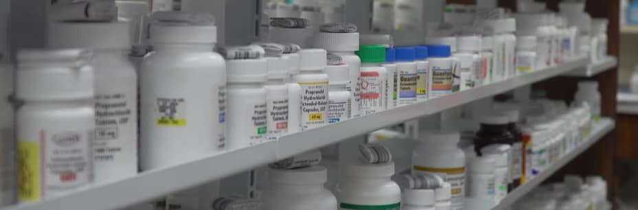bottles of medications on shelves