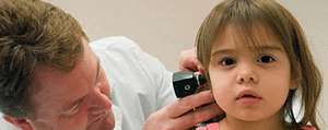 child examined by doctor