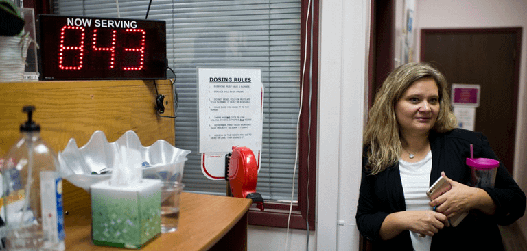 Professional distributing drugs at a methadone clinic