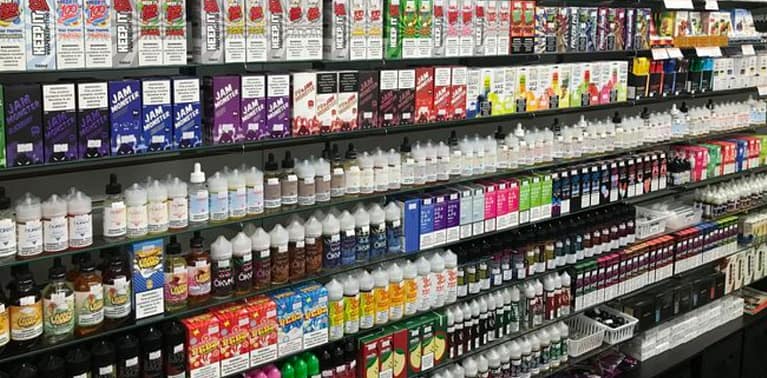 flavored vape liquids on display