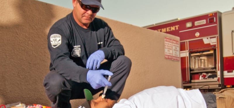 Naloxone administered to an opioid overdose victim by a police officer