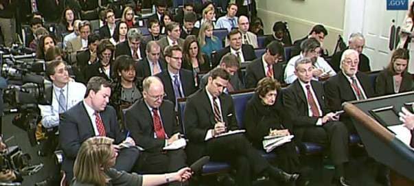 members of the press at a news conference